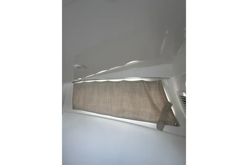 Slide: The Image of 2023 Sportsman Open 352 Center Console interior with window shade. - 38