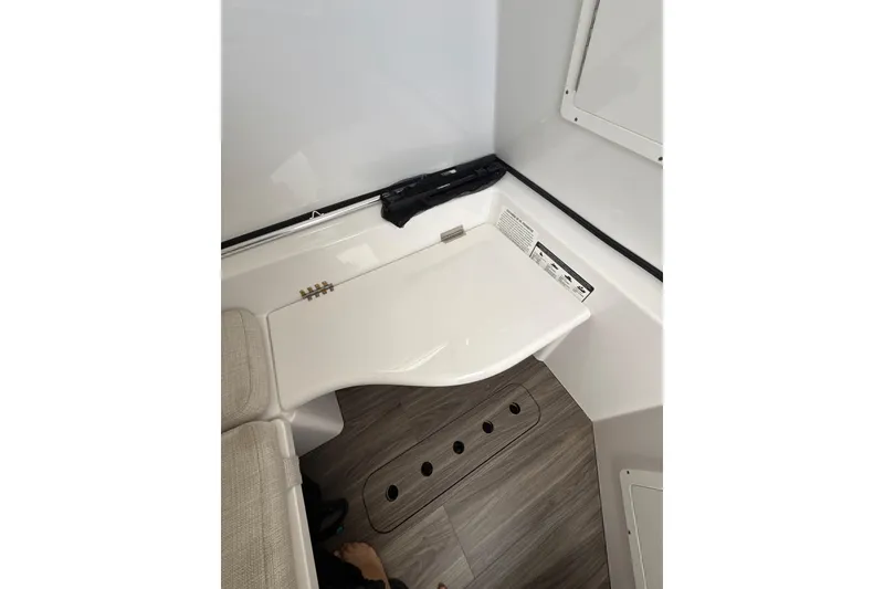 Slide: The Image of 2023 Sportsman Open 352 Center Console interior with sleek design and modern flooring. - 39