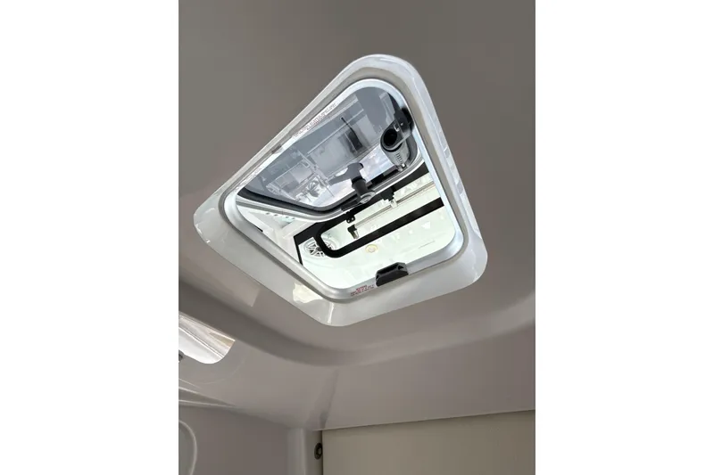 Slide: The Image of 2023 Sportsman Open 352 Center Console boat hatch interior view. - 43