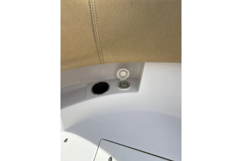 Slide: The Image of 2023 Sportsman Open 352 Center Console interior detail with beige upholstery and control panel. - 69