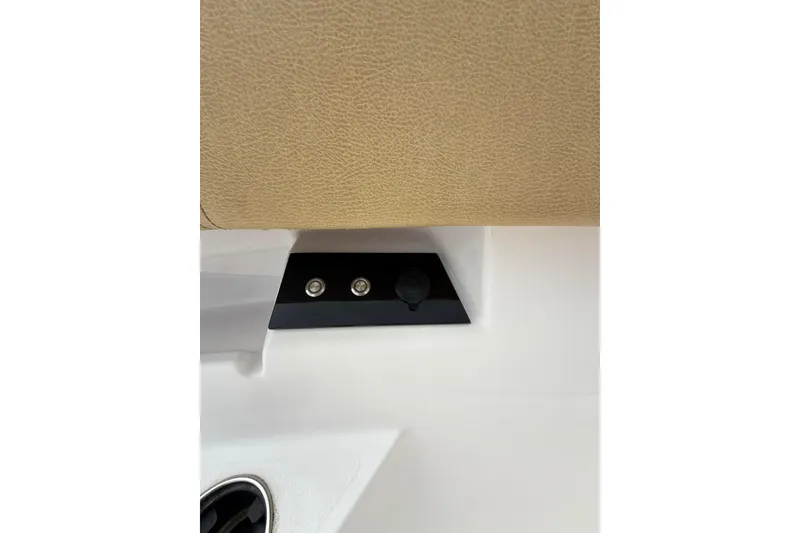 Slide: The Image of 2023 Sportsman Open 352 Center Console interior detail with beige upholstery and control panel. - 70