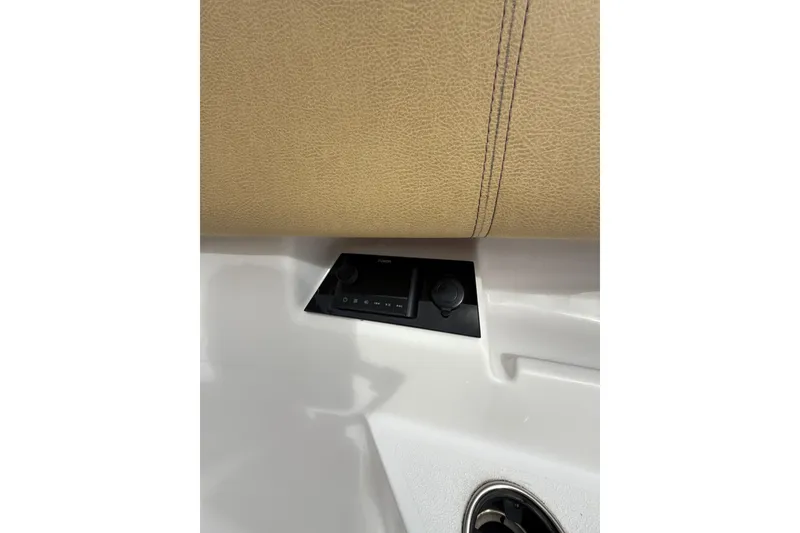 Slide: The Image of 2023 Sportsman Open 352 Center Console interior detail with control panel and beige upholstery. - 71