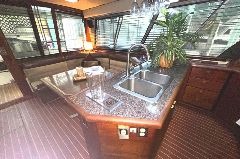 Slide: The Image of Luxurious interior of 1989 Bayliner 4588 Pilothouse. - 12