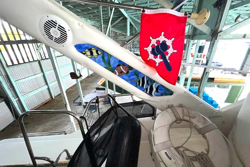 Slide: The Image of Art work inlayed in the radar arch, speakers, throw ring, life raft. - 76