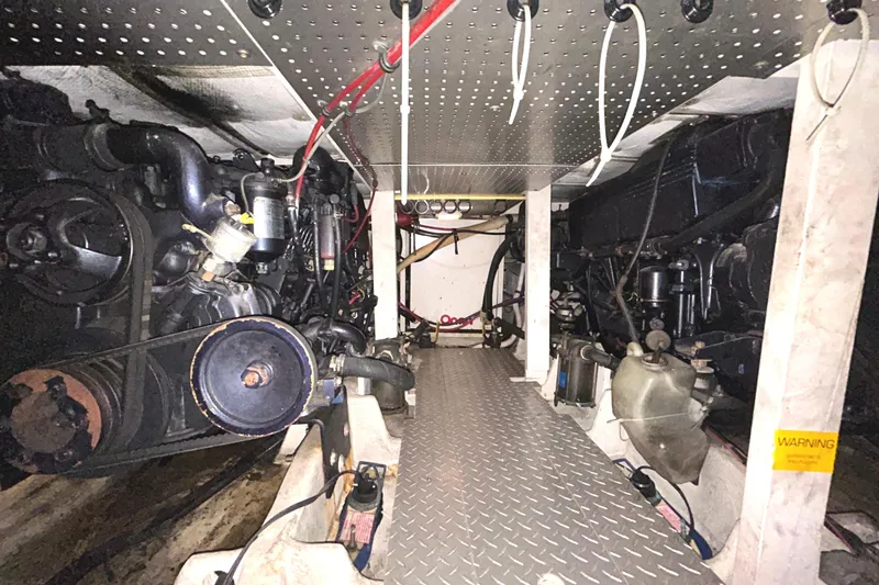 Slide: The Image of Engine room of 1989 Bayliner 4588 Pilothouse. - 85