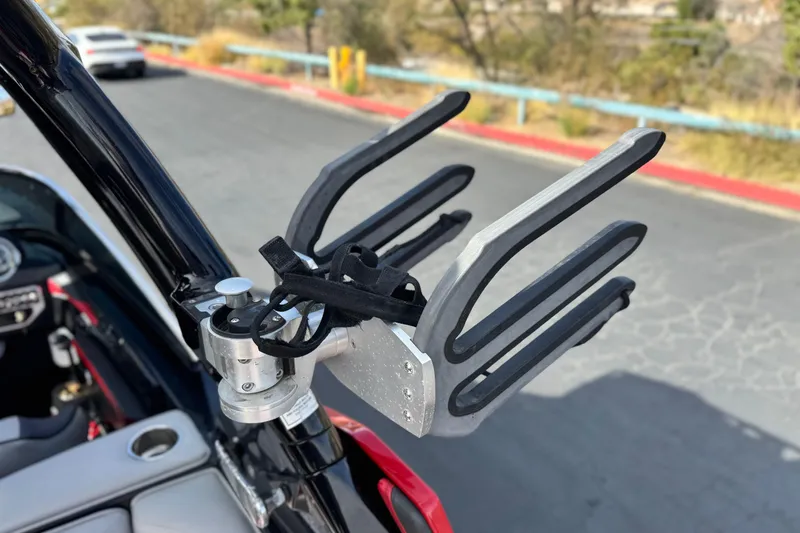 Slide: The Image of 2014 Supra SA350 boat with a mounted wakeboard rack. - 14