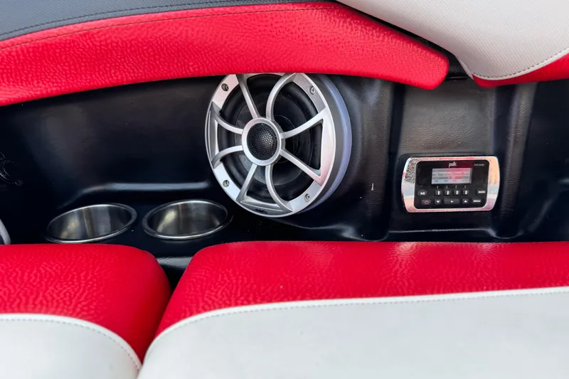 Slide: The Image of Red and white interior of 2014 Supra SA350 with speaker and control panel. - 22