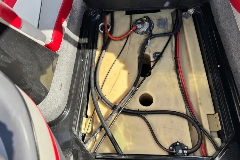 Slide: The Image of 2014 Supra SA350 boat interior showing wiring and components. - 31