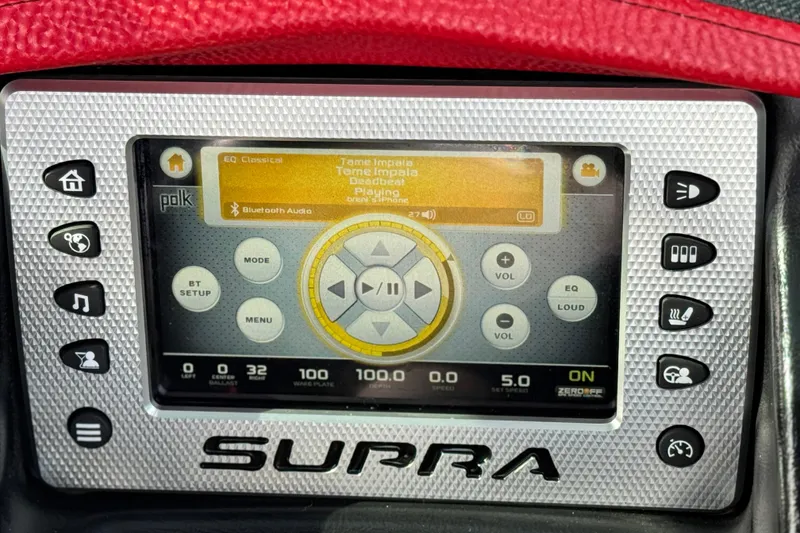 Slide: The Image of 2014 Supra SA350 dashboard display with audio controls and settings interface. - 36