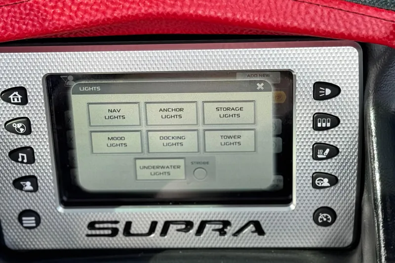 Slide: The Image of 2014 Supra SA350 dashboard display with various light controls and buttons. - 38