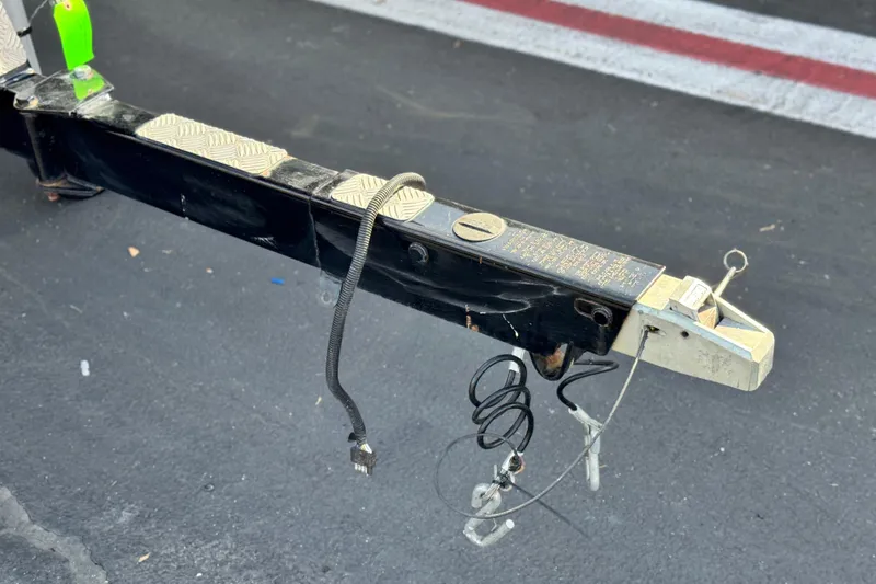 Slide: The Image of Trailer hitch of a 2014 Supra SA350 on asphalt surface. - 44