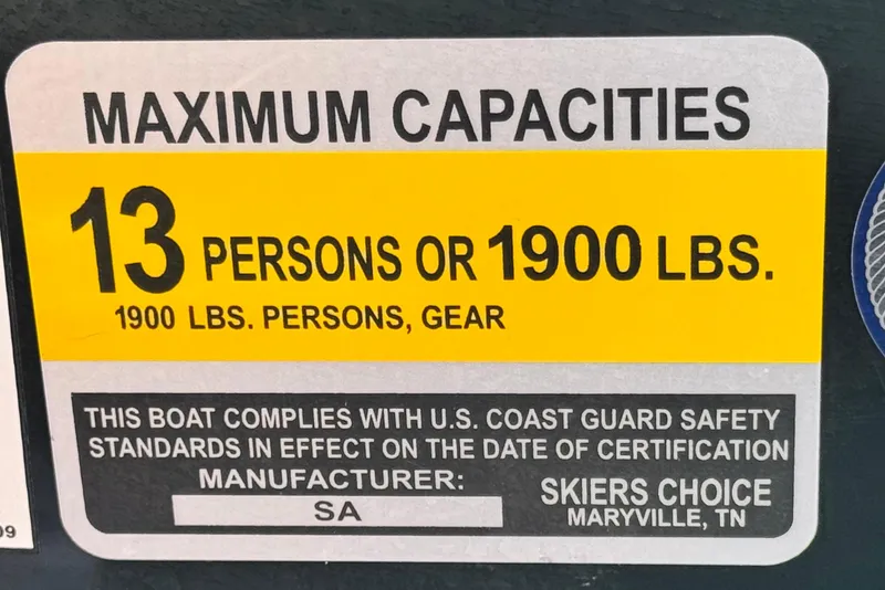 Slide: The Image of 2014 Supra SA350 capacity label: 13 persons or 1900 lbs, U.S. Coast Guard compliant. - 45
