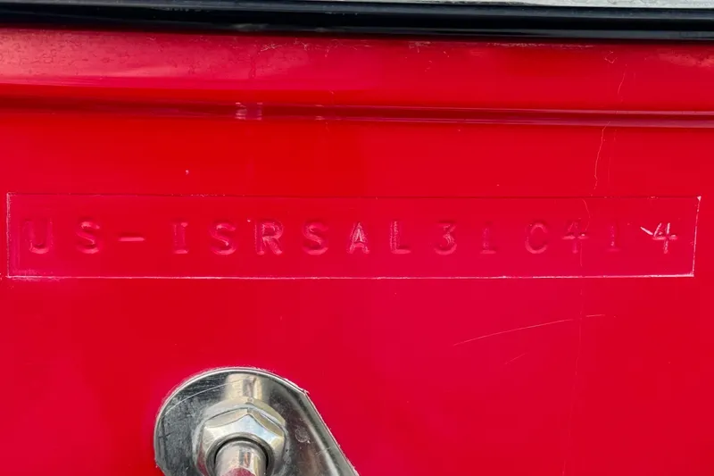 Slide: The Image of Red 2014 Supra SA350 with embossed serial number detail. - 46