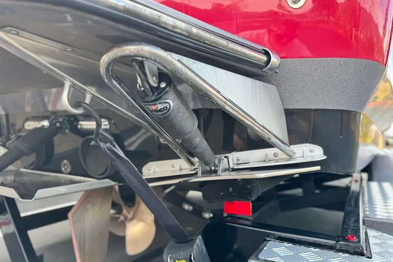 Slide: The Image of 2014 Supra SA350 boat stern with propeller and metal components. - 9