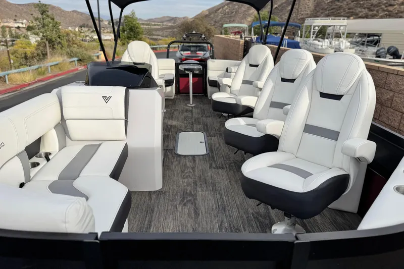 Slide: The Image of Luxurious 2023 Viaggio Diamante 23E pontoon boat interior with plush seating and modern design. - 10