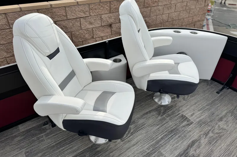 Slide: The Image of Luxurious white seats in 2023 Viaggio Diamante 23E boat, featuring modern design and comfort. - 12