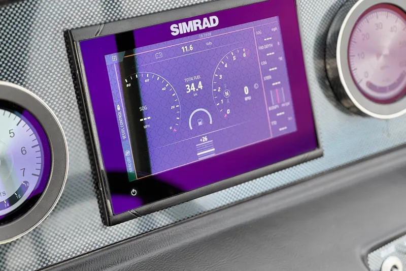 Slide: The Image of Dashboard of 2023 Viaggio Diamante 23E with Simrad display and gauges. - 24