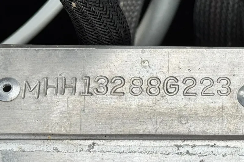 Slide: The Image of Serial number "MHH13288G223" on a 2023 Viaggio Diamante 23E metal surface. - 31
