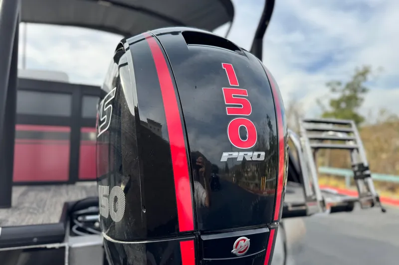 Slide: The Image of Close-up of a 2023 Viaggio Diamante 23E boat engine, featuring "150 PRO" branding. - 8