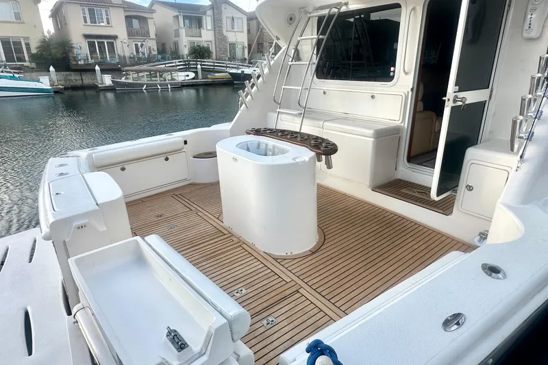 Slide: The Image of 2007 Riviera Sport Fisherman boat deck with scenic waterfront view. - 41