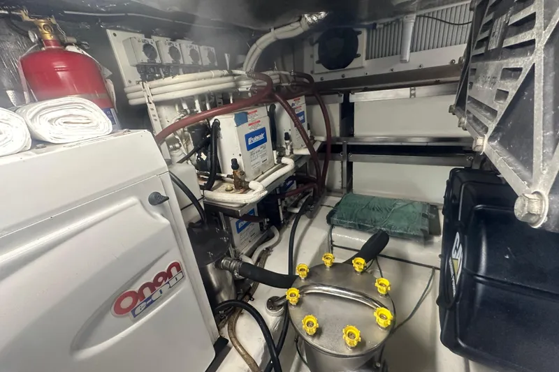 Slide: The Image of Engine room components of a 2007 Riviera Sport Fisherman boat. - 50