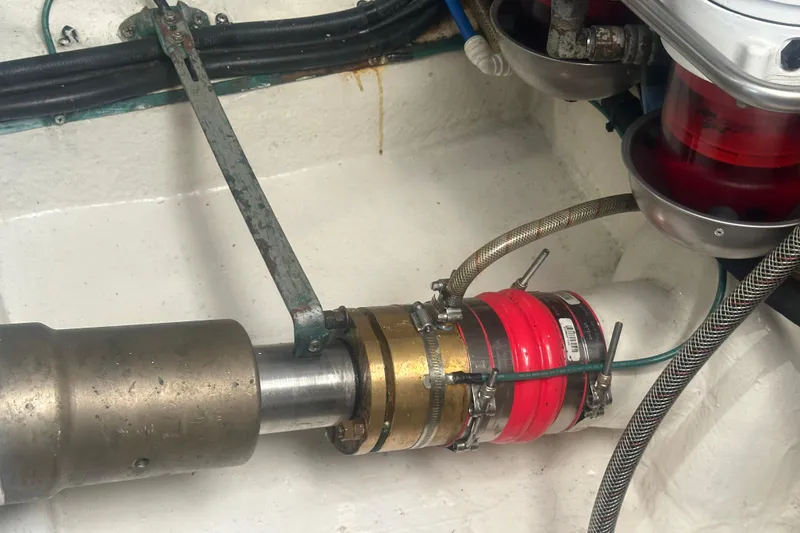 Slide: The Image of Engine room of a 2007 Riviera Sport Fisherman boat, featuring CAT marine power systems. - 48