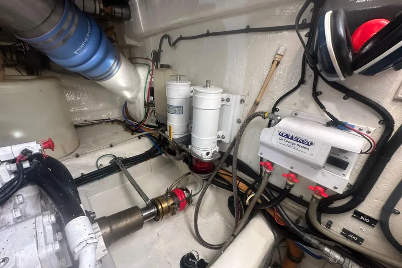 Slide: The Image of Onan marine generator in 2007 Riviera Sport Fisherman engine room. - 49