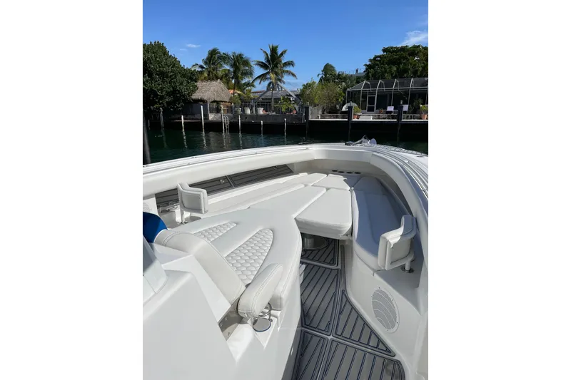 Slide: The Image of 2019 HCB 42 Siesta boat deck with sleek design and waterfront view. - 11