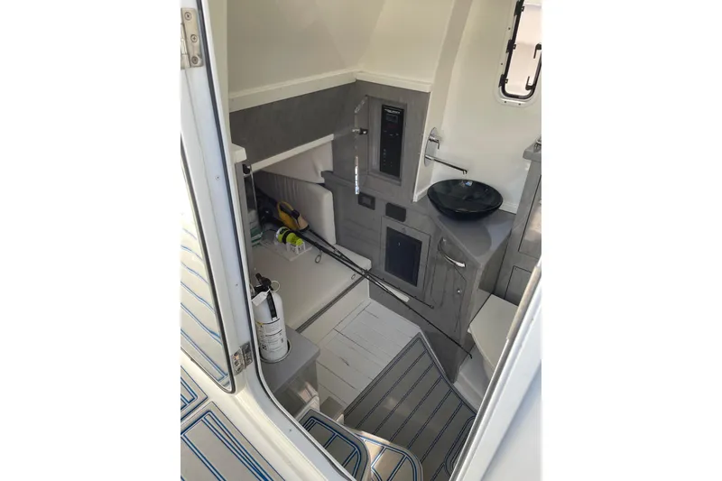 Slide: The Image of Interior of 2019 HCB 42 Siesta boat, featuring modern design and amenities. - 20