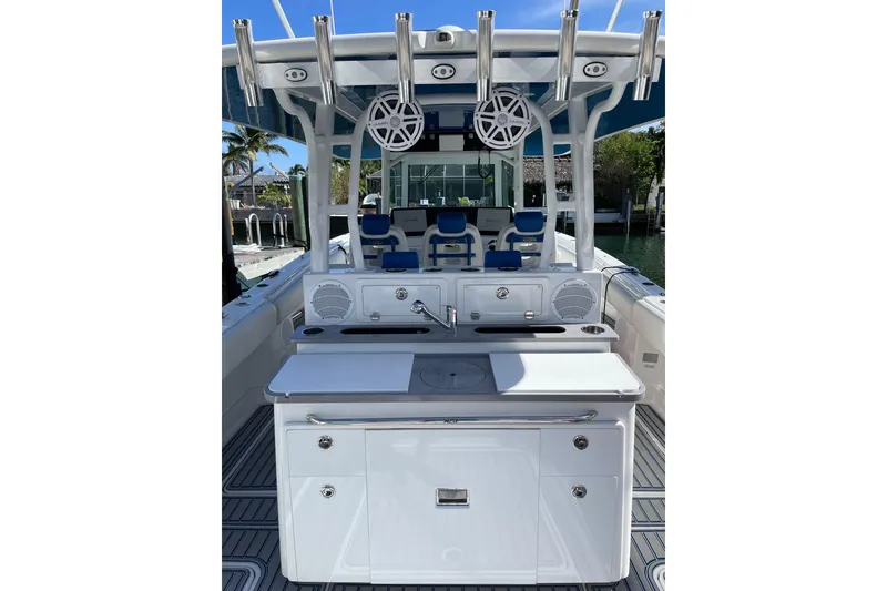 Slide: The Image of 2019 HCB 42 Siesta boat deck with open storage compartment. - 7