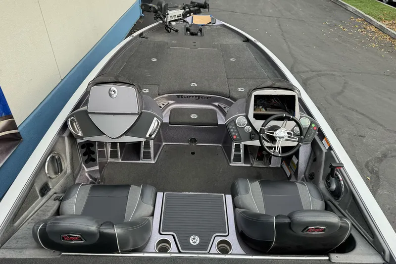 Slide: The Image of 2016 Ranger Z521 Comanche boat interior with dual seats and steering console. - 5