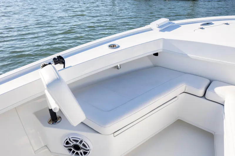 Slide: The Image of 2023 Pair Customs 24 Center Console DV boat interior with white seating and ocean view. - 17