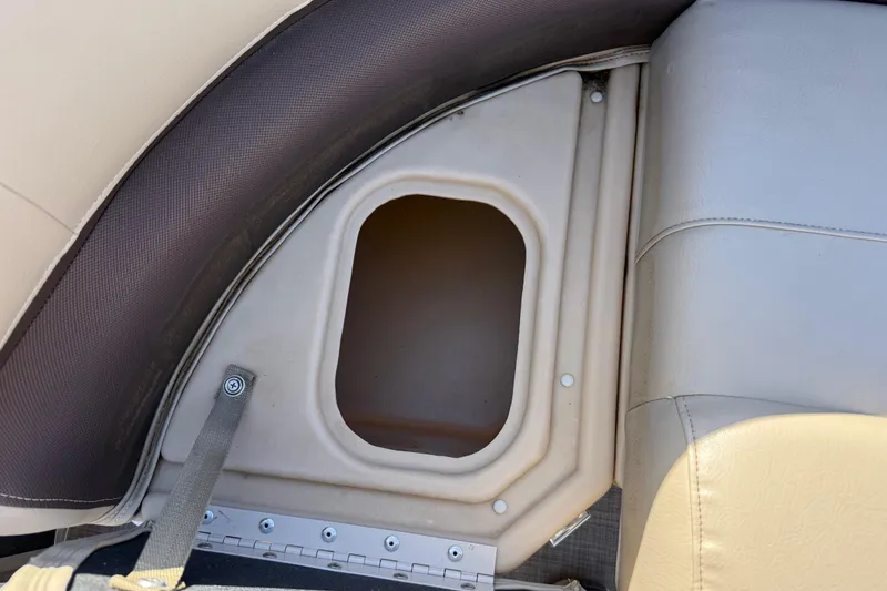 Slide: The Image of 2018 Sun Tracker Party Barge 18 DLX with beige seating by the water. - 29