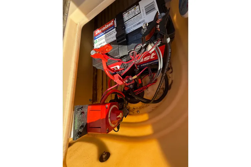 Slide: The Image of 2018 Sun Tracker Party Barge 18 DLX steering console with gauges and controls. - 38