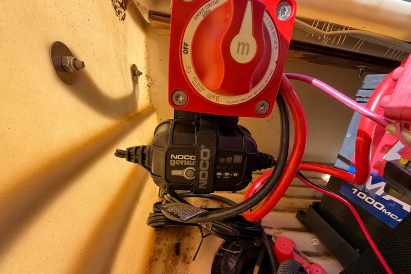 Slide: The Image of 2018 Sun Tracker Party Barge 18 DLX pontoon boat on trailer by the water. - 39