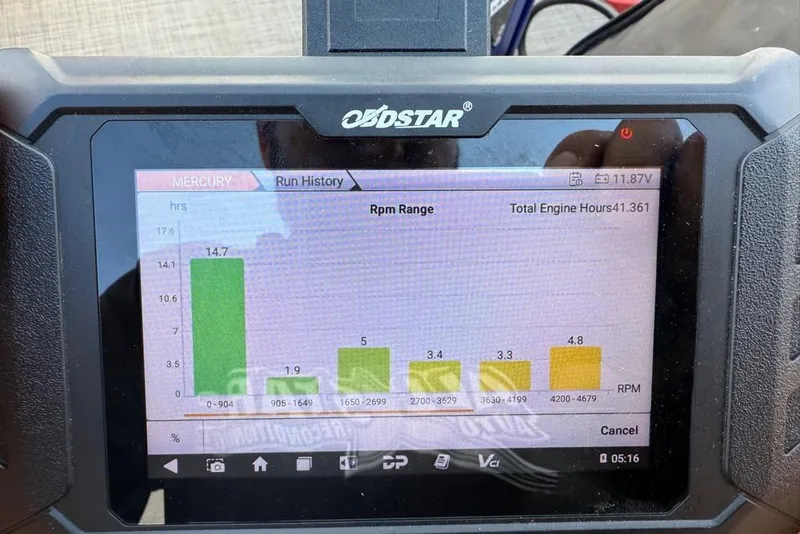 Slide: The Image of 2018 Sun Tracker Party Barge 18 DLX pontoon boat on trailer by a lake. - 6