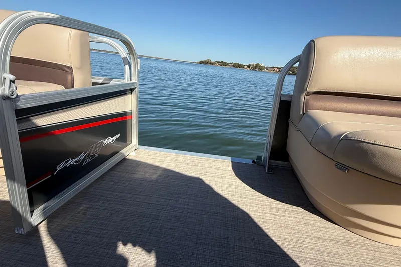 Slide: The Image of Close-up of a worn tire tread on a 2018 Sun Tracker Party Barge 18 DLX. - 68