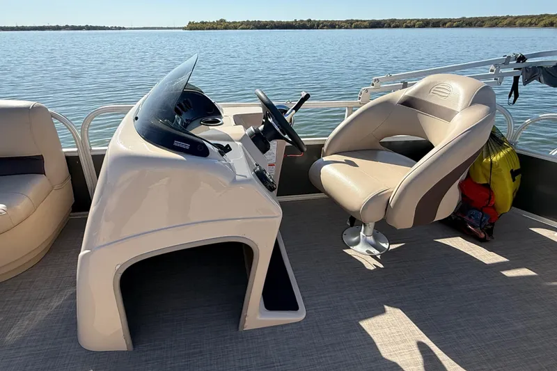 Slide: The Image of Close-up of a black wheel and tire from a 2018 Sun Tracker Party Barge 18 DLX. - 69