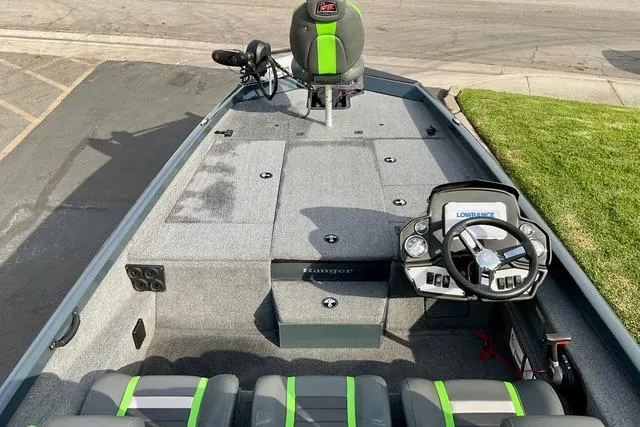 Slide: The Image of 2023 Ranger RT198P fishing boat interior with steering console and seating. - 15