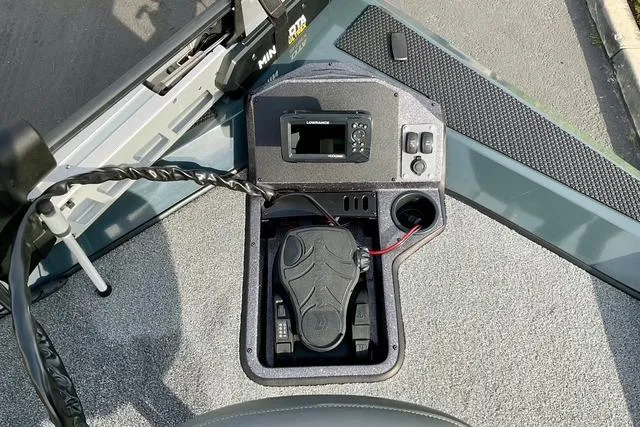 Slide: The Image of 2023 Ranger RT198P boat console with foot pedal and electronic display. - 22