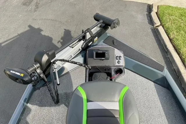 Slide: The Image of 2023 Ranger RT198P boat interior with trolling motor and control panel. - 23