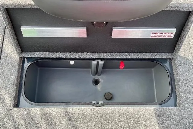 Slide: The Image of 2023 Ranger RT198P boat storage compartment with pump-out feature, gray interior. - 4