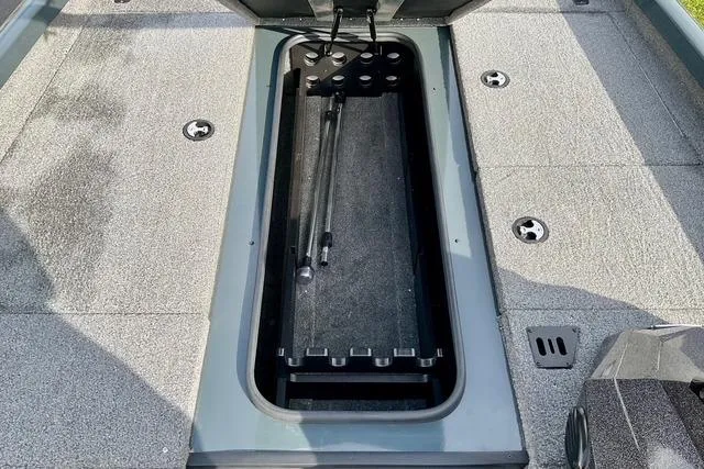 Slide: The Image of 2023 Ranger RT198P boat storage compartment with hydraulic lift. - 8
