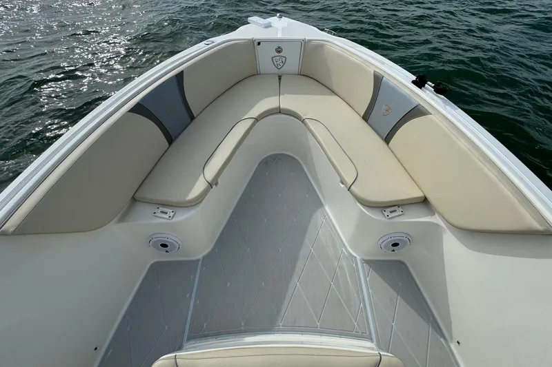 Slide: The Image of 2015 Century 2600 CC boat interior with cushioned seating and ocean view. - 12