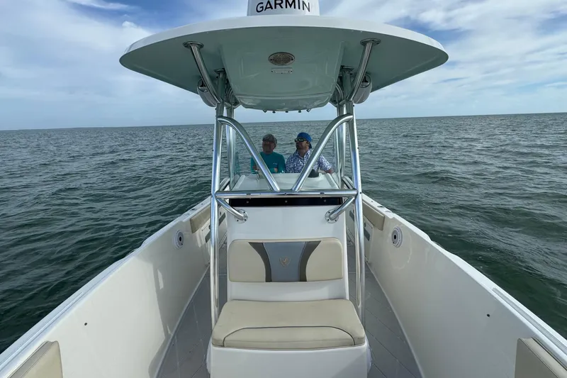 Slide: The Image of Century 2600 CC boat on open water, 2015 model, with two people onboard. - 21