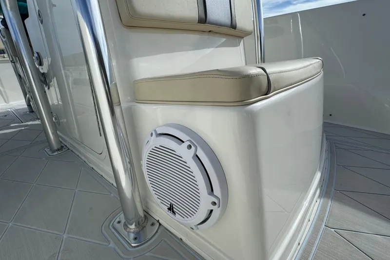 Slide: The Image of Century 2600 CC 2015 boat interior with cushioned seating and speaker detail. - 28