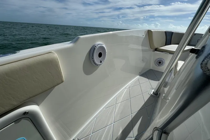 Slide: The Image of 2015 Century 2600 CC boat interior with cushioned seating and ocean view. - 29