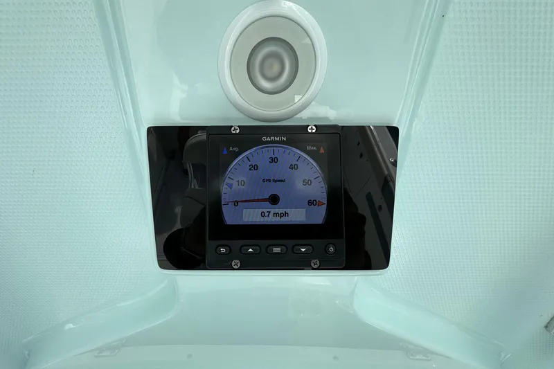 Slide: The Image of Garmin GPS speedometer on 2015 Century 2600 CC boat dashboard, displaying 0.7 mph. - 43