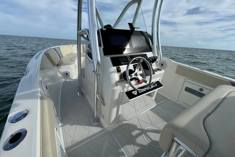 Slide: The Image of 2015 Century 2600 CC boat interior with steering wheel, ocean view. - 48