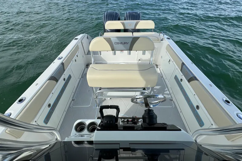Slide: The Image of 2015 Century 2600 CC boat interior with dual engines on open water. - 52